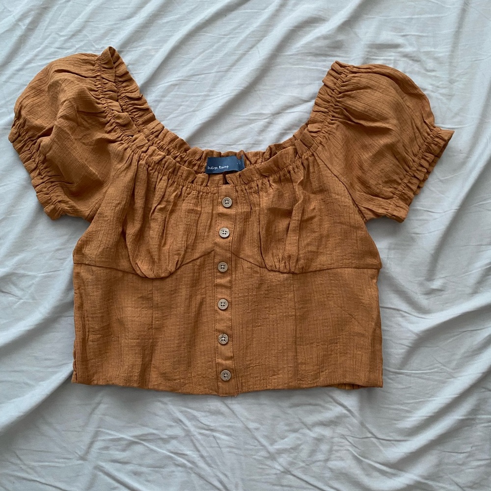 Light brown buttoned down blouse